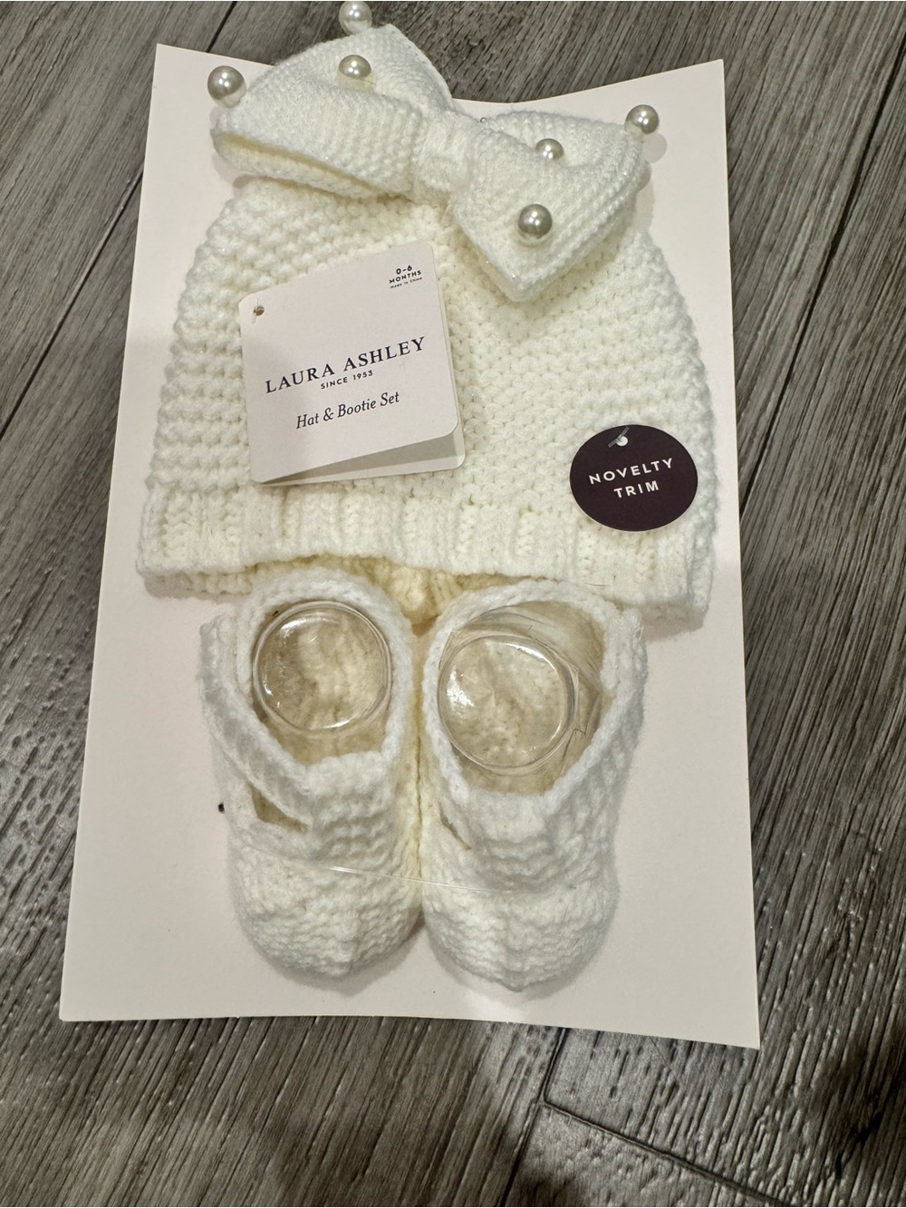 Laura Ashley Cream Knitted Baby Hat & Booties Set with Pearl Bow Trim